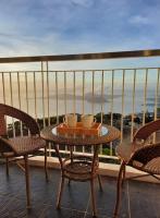 B&B Tagaytay - 1 BR Cozy Farmhouse-Style Condo with Balcony & Taal View at Wind Residences - Bed and Breakfast Tagaytay