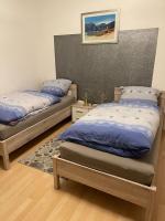 Doppel- oder Zweibettzimmer