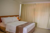 Chambre Double Deluxe - Vue Latérale sur Mer