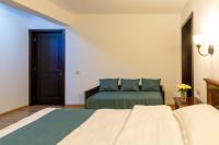 Camera Matrimoniale Deluxe (2 Adulti + 1 Bambino) 