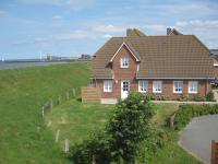 Direkt am Deich - Ferienwohnung Amrum im Gästehaus Am Badedeich - B&B