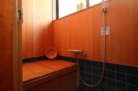 Japanese-Style Family Room with Shared Bath