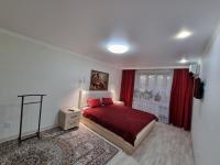 Посуточная квартира на Мухита c Wi-Fi - Chambres d'hôtes Oural