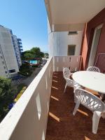 One-Bedroom Apartment with Balcony and Lateral Sea View