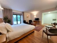 Suite mit Kingsize-Bett und Balkon