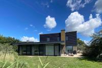 Luxe 8 persoons ‘Golfvillatexel’ vlakbij zee - B&B