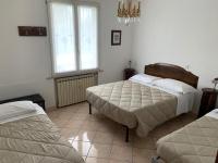 Camera Tripla con Vista Giardino