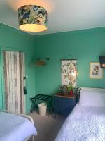 Tweepersoonskamer met 2 Aparte Bedden en Balkon