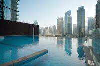 Luton Vacation Homes - Luxury & Sea View 1BR - Jumeirah Living Marina Gate Tower 3 - 40AB12 - Chambres d'hôtes Dubaï