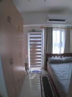 SM South Residences, 1 bedroom with balcony. - Chambres d’hôtes Manille