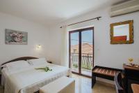 Triple Room with Balcony and Sea View