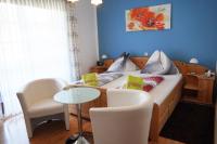 Dreibettzimmer mit Balkon