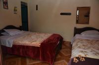 Tweepersoonskamer met 2 Aparte Bedden