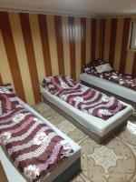 Basic Dreibettzimmer mit Gemeinschaftsbad