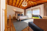 Deluxe Zimmer mit Whirlpool-Badewanne und Meerblick