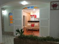 "Excelente Casa Pé na Areia com Opção de Piscina Aquecida Cobrado á Parte, Ampla Área de Lazer, Deck Coberto com Churrasqueira e Cooktop, Cozinha Americana, Ampla Sala de Estar com Lindíssima Lareira, Smart TV 50", WI-FI e o Melhor fica Pertinho da Praia" - Ferienwohnung Praia Grande