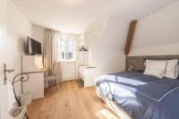 Chambre Lit Queen-Size avec Salle de Bains Commune 