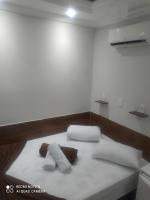 B&B Aparecida - Pousada Quarto Casal com ar,frigobar, garagem - Bed and Breakfast Aparecida