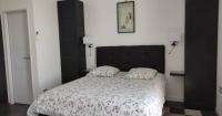 Dreibettzimmer mit Gartenblick