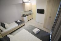Dreibettzimmer mit Stadtblick
