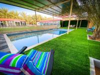 B&B Ras el Khaïmah - Palm Escape Farmhouse - By Seven Elements - Bed and Breakfast Ras el Khaïmah