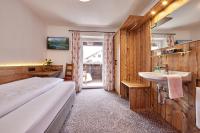 Camera Singola con Doccia e Servizi Igienici in Comune