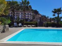 Minerva Apartment Azuria & Tulipan Apartment by Taormina Holidays - Chambres d'hôtes Taormina