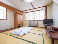 Dreibettzimmer mit Gemeinschaftsbad