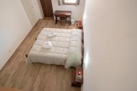 Camera Piccola Doppia con Letti Singoli