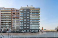 Gelijkvloers zeedijk appartement - lichtrijk en modern - B&B