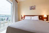 Kamer met Queensize Bed en Uitzicht op Zee