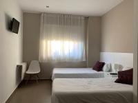 Tweepersoonskamer met 2 Aparte Bedden