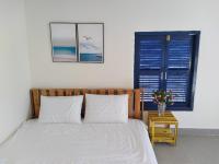 Kamer met Queensize Bed en Uitzicht op de Tuin