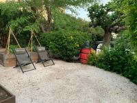 Les dahlias appartement 4 personnes Jacuzzi Barbecue Jardin arboré Climatisé - Chambres d'hôtes Agde