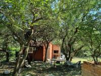 Zimmer mit Queensize-Bett und Gartenblick