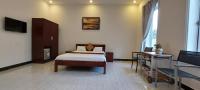 Chambre Lit King-Size Deluxe