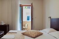 Chambre Double Deluxe (2 Adultes + 1 Enfant)