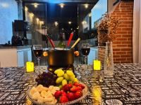 Uai House com jacuzzi, teto rooftop retrátil e colchão massageador - B&B Poços de Caldas