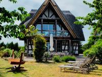 B&B Grüssow - Landhaus am Achterwasser mit Bootssteg - Bed and Breakfast Grüssow