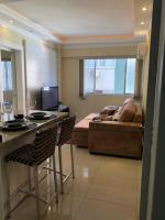 PÉ NA AREIA - Suíte à beira-mar com garagem - B&B Balneário Camboriú