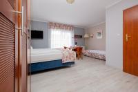 Dreibettzimmer mit Balkon