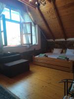 Kamer met Kingsize Bed en Uitzicht op de Bergen