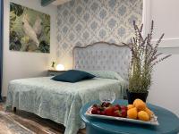 Camera Quadrupla Superior