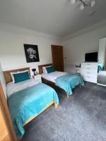 Camera Doppia con Letti Singoli con Vista Giardino