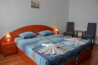 Doppel- oder Zweibettzimmer