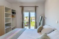 Doppelzimmer mit Balkon und Meerblick