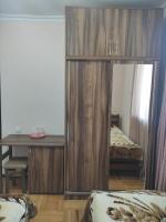 Camera Matrimoniale/Doppia con Letti Singoli con Bagno in Comune