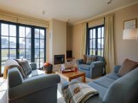 Reetland am Meer - Luxus Reetdachvilla mit 3 Schlafzimmern, Sauna und Kamin F20 - B&B Dranske