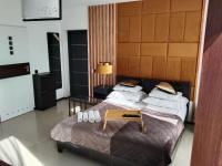 Deluxe Quadruple Room with Kitchenette