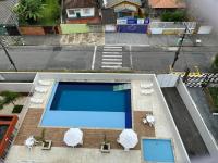 Guarujá condomínio Villa Di fiori AP jasmim - Chambres d'hôtes Guarujá